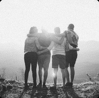 Friends embracing outdoors