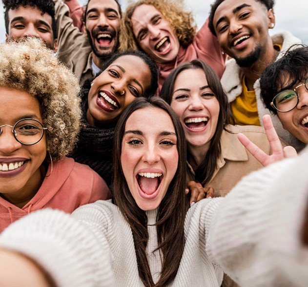 Group of happy students taking a selfie