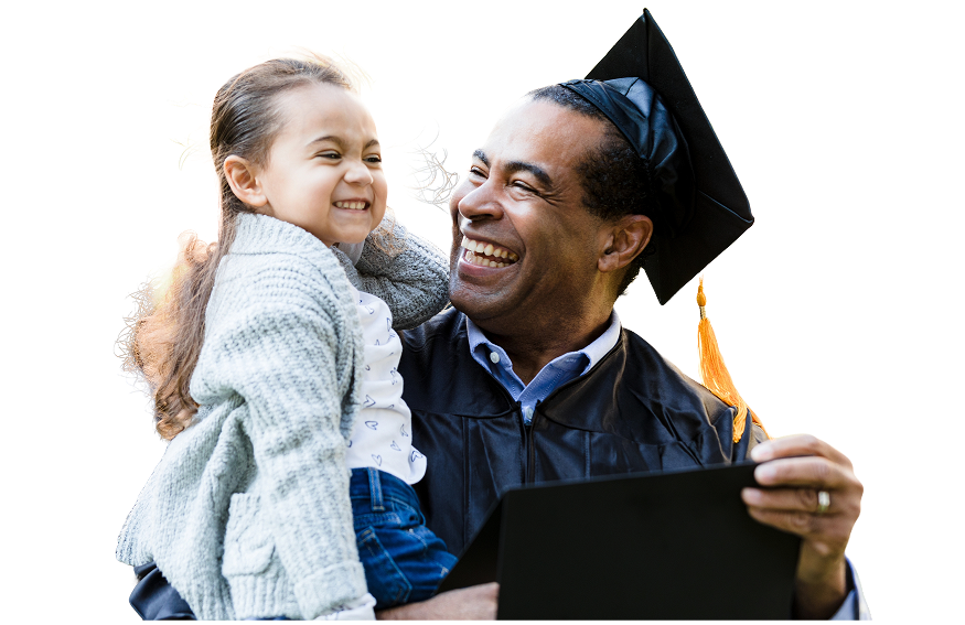 Graduate in cap and gown smiling with a child
